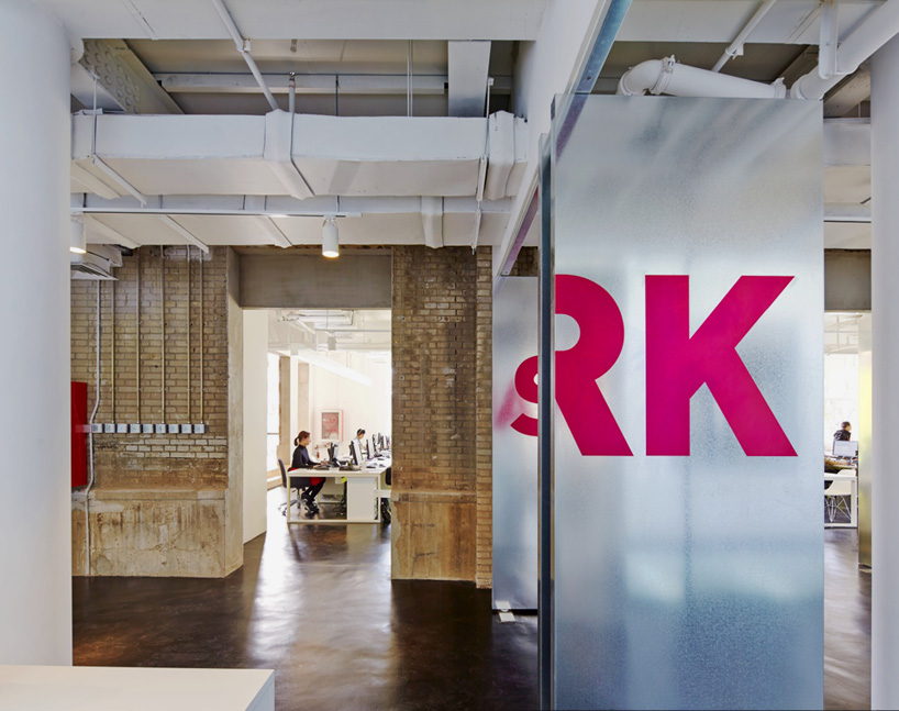 SPARK's beijing office is partitioned using metal-clad swivel doors