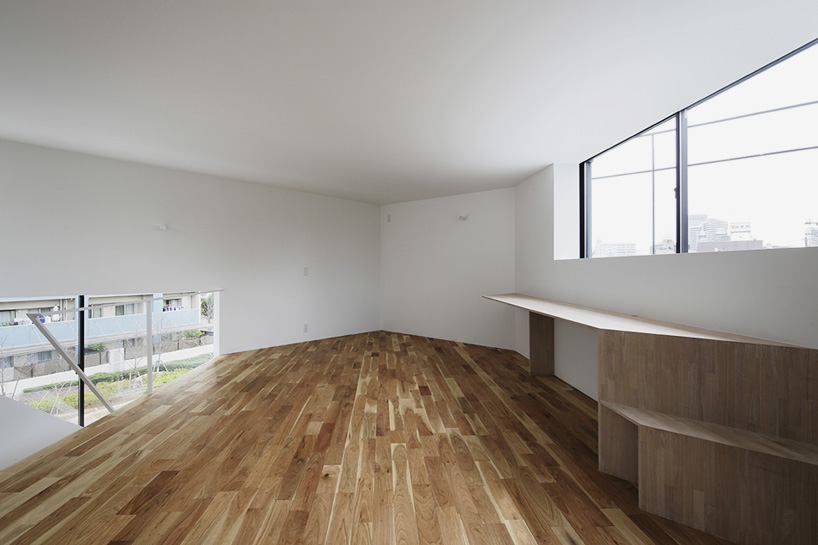 alphaville spiral window house osaka japan designboom