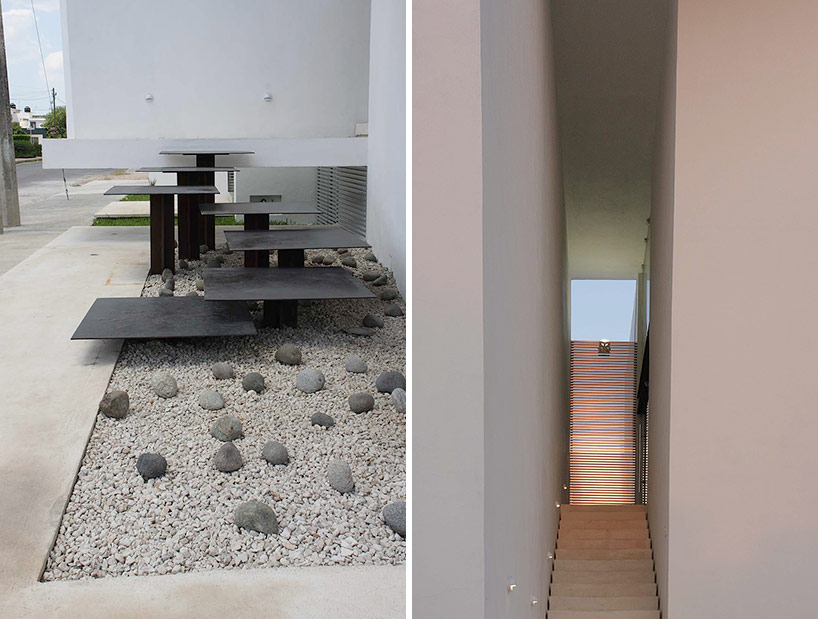 AS arquitectura fits three different offices into a concrete cube