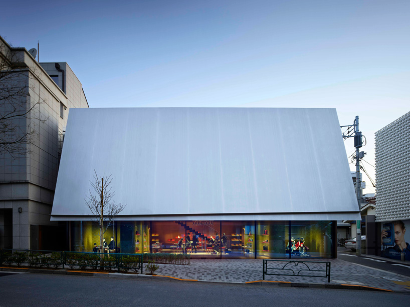 herzog & de meuron clads miu miu store in tokyo with angled canopy