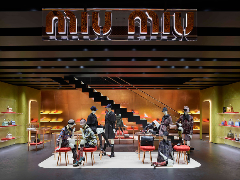 herzog de meuron clads miu miu store with angled canopy