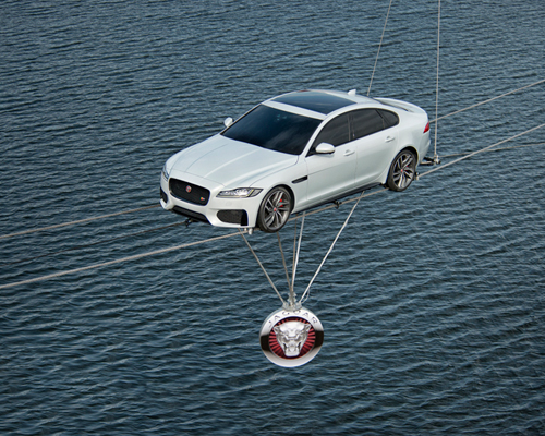 jaguar XF completes longest suspended journey over london's water