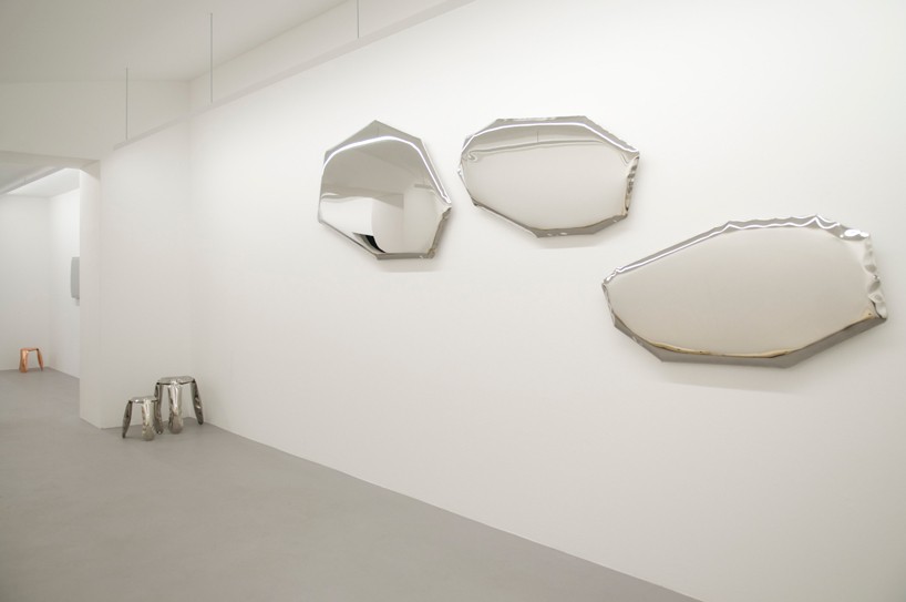 oskar zieta tafla mirrors' unusual form reflects your unique world
