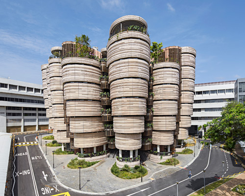 thomas heatherwick's learning hub in singapore comprises 12 tapered towers