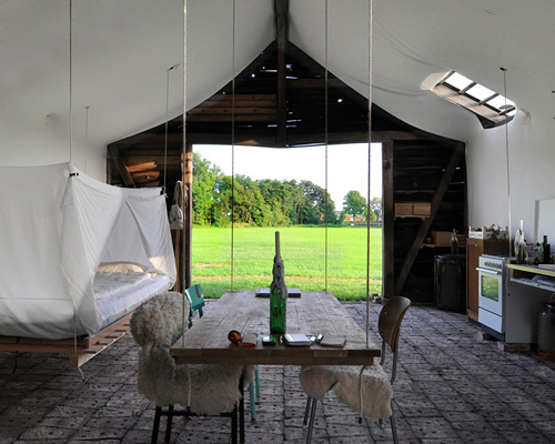 uli schallenberg modifies old wooden barn into a luminous living space