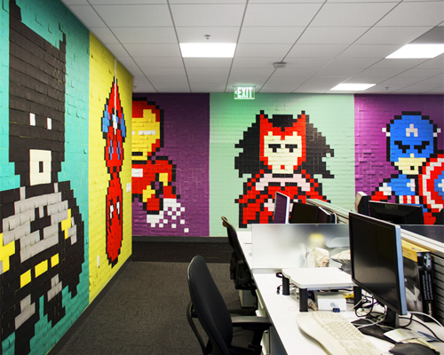 office workers install 8-bit superhero mural using 8,024 sticky notes