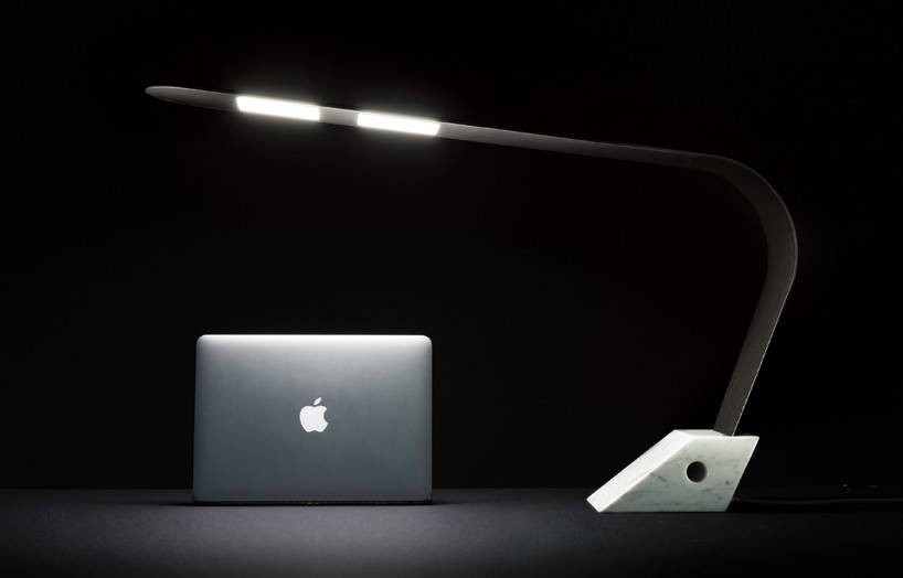 T°RED C7OLED lamp blends continuous carbon fiber line into marble base