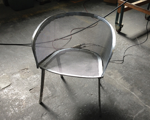 ronan + erwan bouroullec explore metal manufacturing with stampa chair for kettal