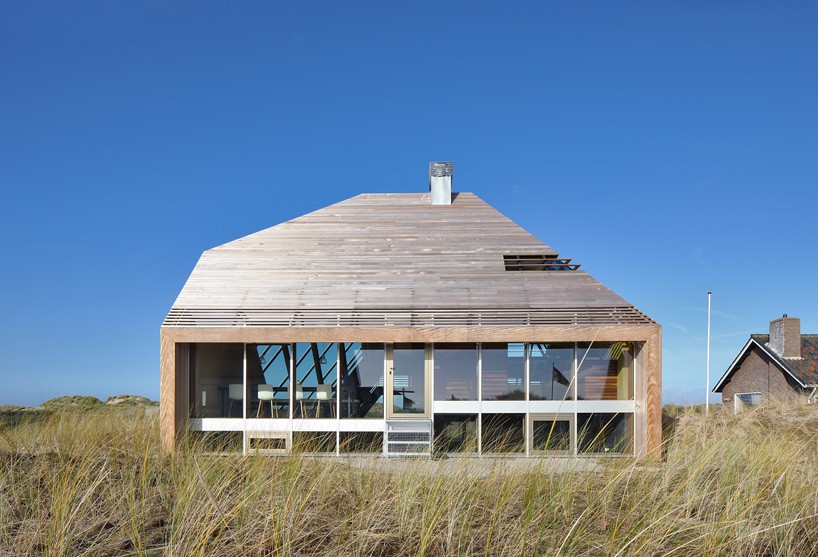 marc koehler embeds dune house into the topographic landscape