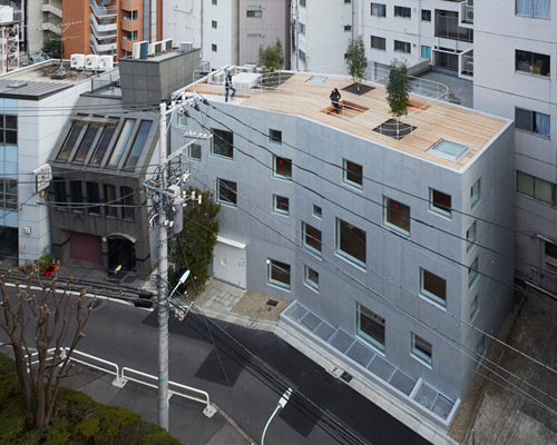 florian busch architects playfully places windows on r4 building in tokyo