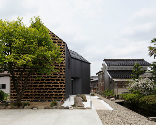 AE5's kaga house in rural japan displays louvered timber façade