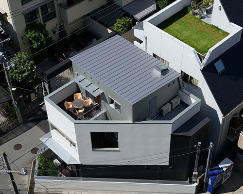 H.ARCHITECTS designs triangular house opposite lush park in japan