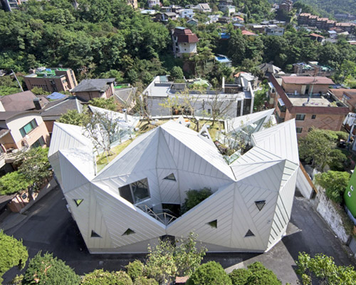 IROJE KHM's angular blooming house offers secluded outdoor living