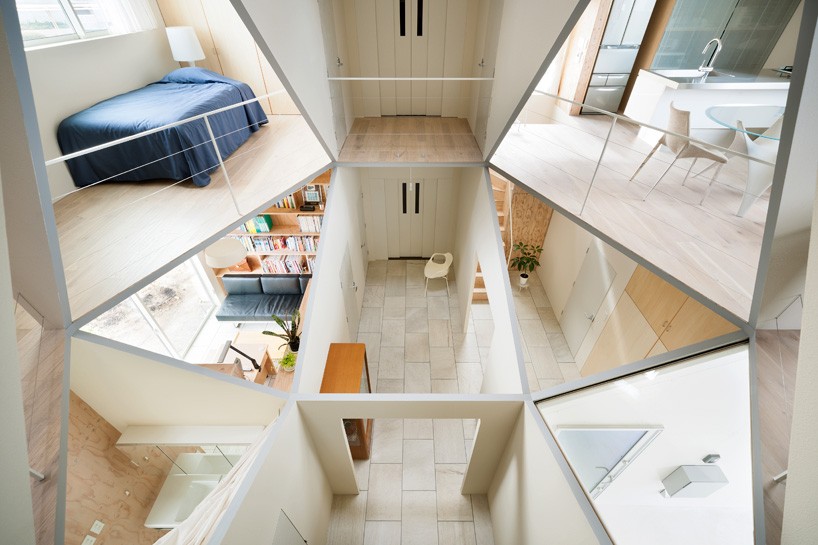 kame house by kochi architect's studio contains a large hexagonal void