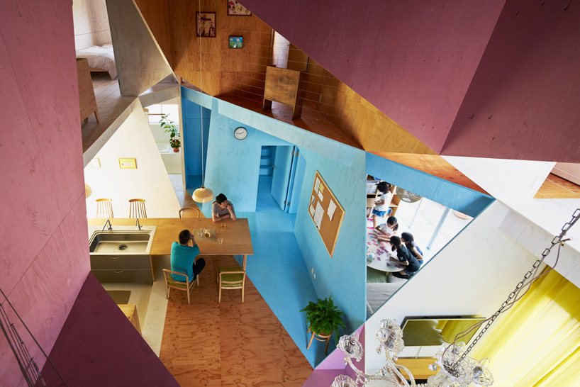 kochi architect’s studio renovates tokyo apartment with asymmetric plywood planes