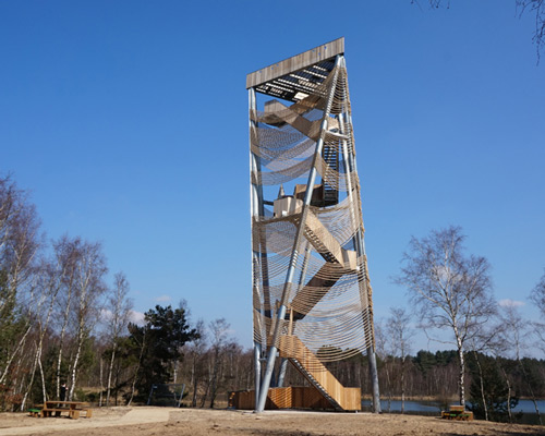 observation tower by ateliereen architecten overlooks pine nature reserve in belgium