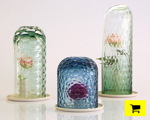 OP-vase by bilge nur saltik multiplies + reflects flower formations