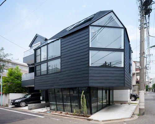 atelier ryo abe organizes perfil house around weathered steel core