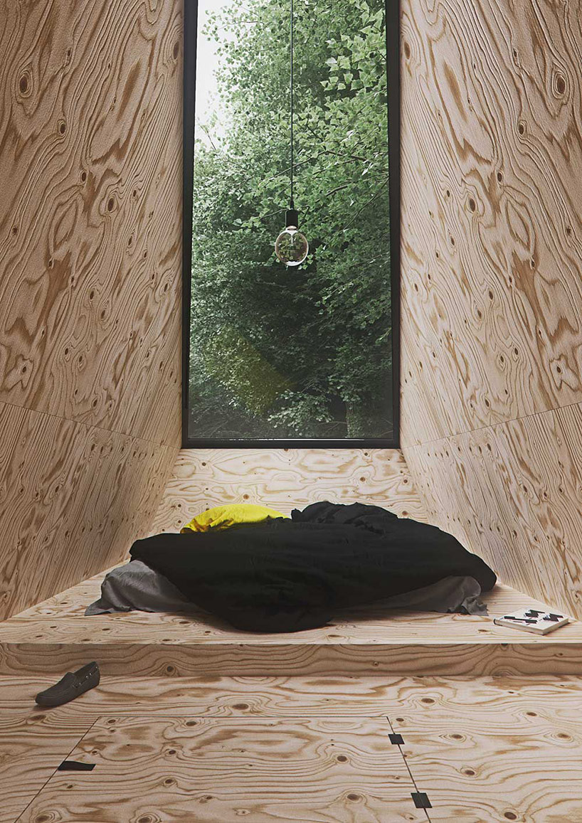 tomek michalski designs a contemplative cabin in the forest