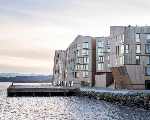 AART architects aligns timber waterfront residences with the norwegian coastline