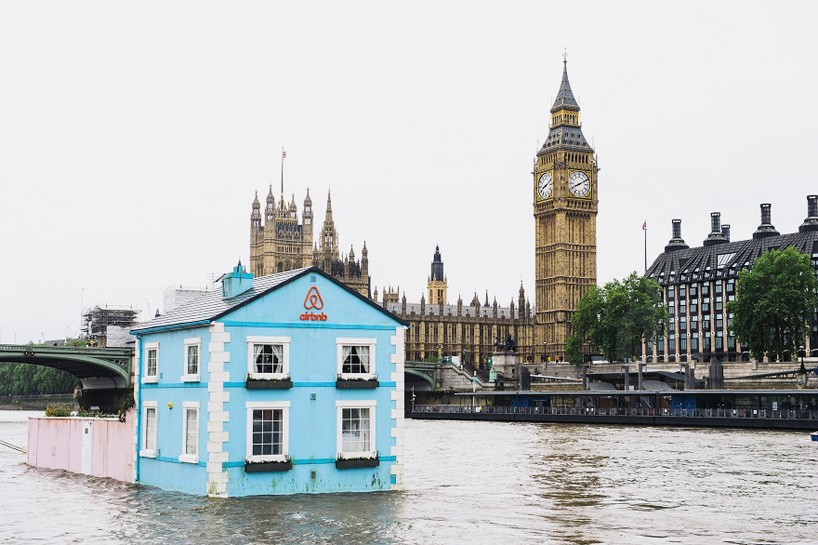 airbnb's fully functioning floating house sets sail along the river thames
