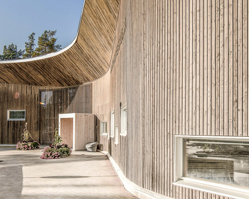 alt architects designs wooden-clad ruukki health clinic in finland