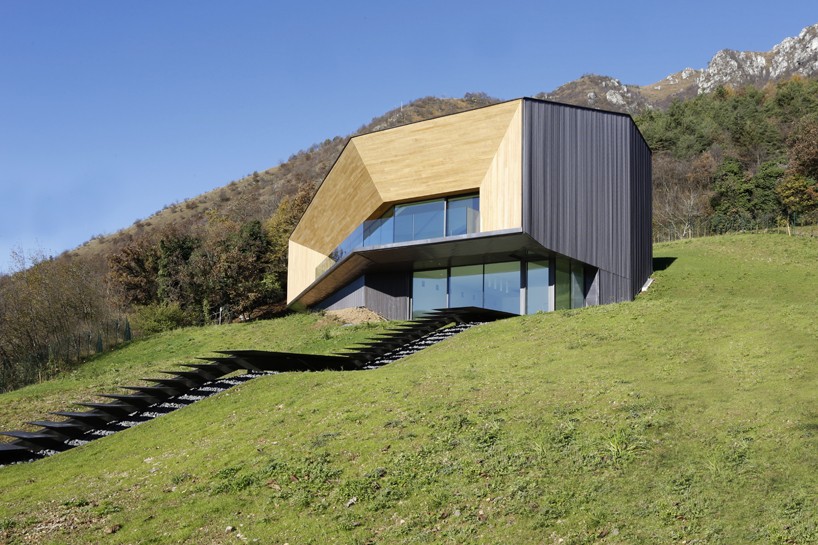 angular dwelling by camillo botticini architetto set into the italian alps