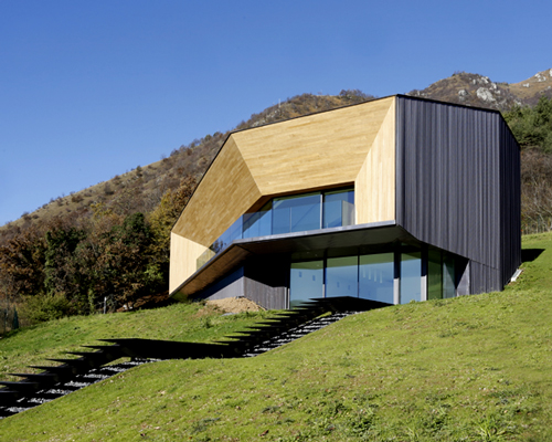 angular dwelling by camillo botticini architetto set into the italian alps