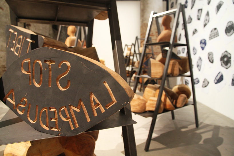 barthélémy toguo's human bust stamp sculptures create an urban requiem