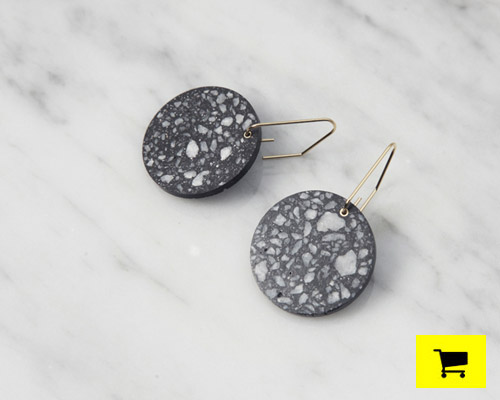 22 design's circle earrings reveal yilan fragments in concrete fixture