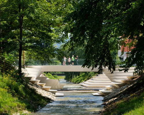 enota's reorganized pedestrian zone in slovenia includes a riverside amphitheater