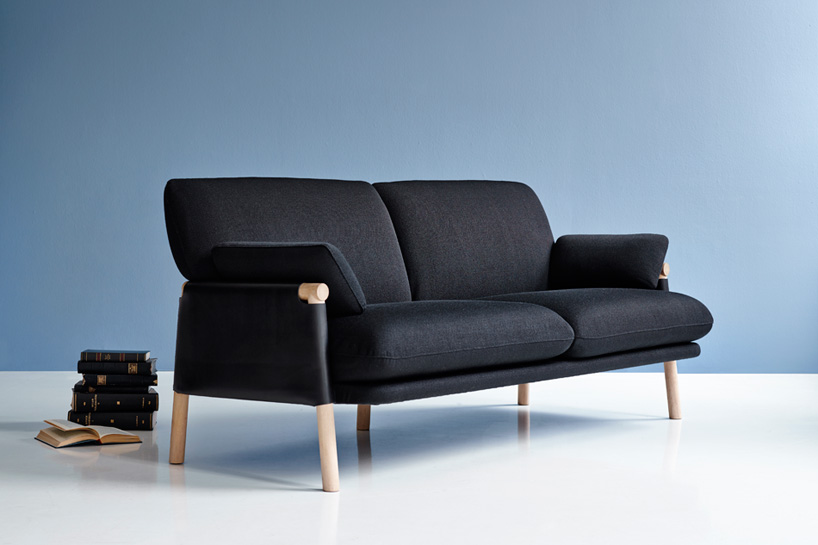 monica förster's savannah sofa features wood frame wrapped in leather