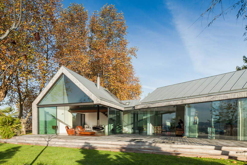 portuguese holiday home by prod comprises 4 gabled volumes