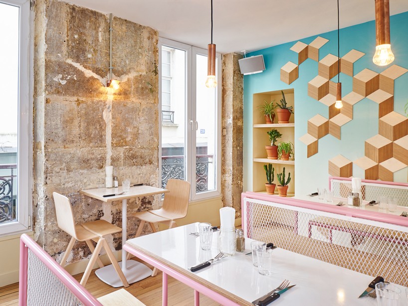 cut architectures infuses PNY restaurant in paris with subtropical elements