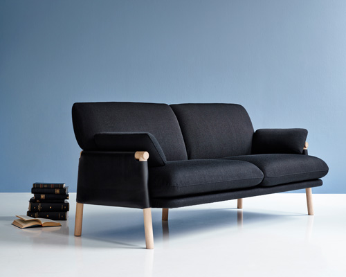 monica förster's savannah sofa features wood frame wrapped in leather