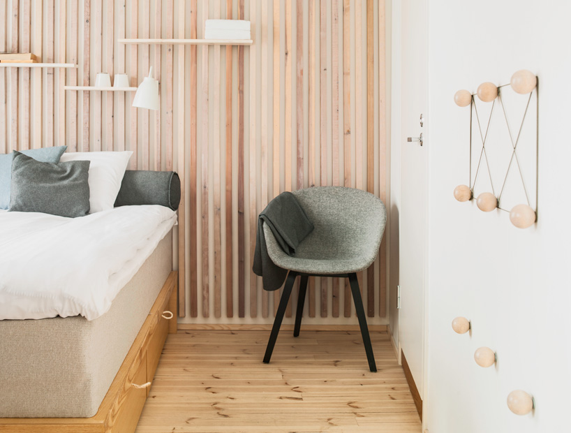 studio puisto places hotel rooms as separate units inside converted warehouse