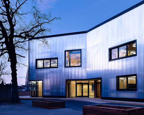 urban projects bureau clads school extension with polycarbonate paneling