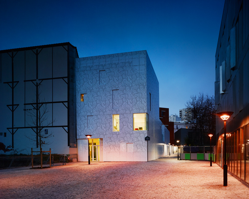 avenier cornejo's playschool in paris features a perforated patterned façade