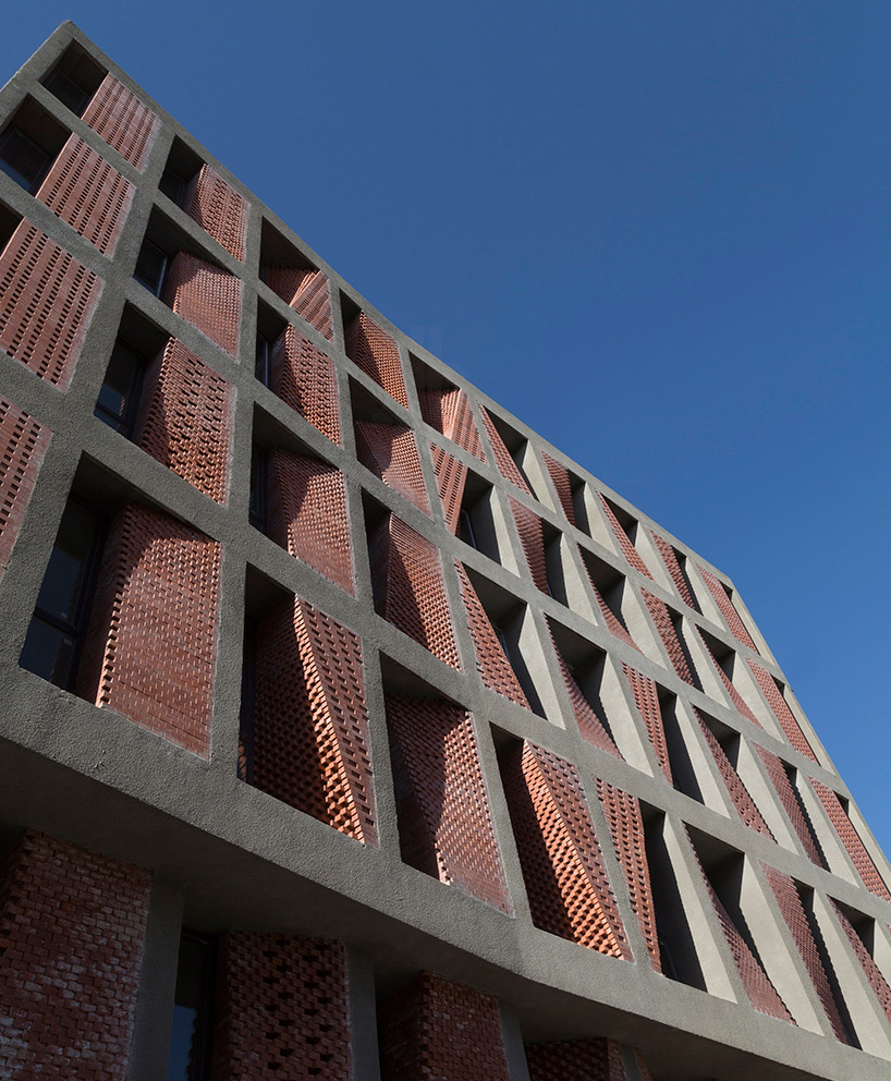 caat studio uses bricks to diversify low-cost apartment complex in iran