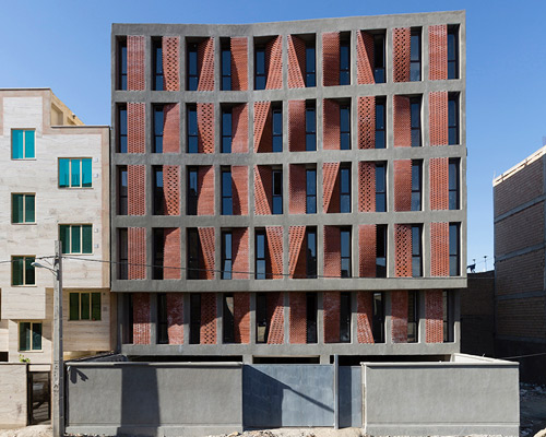 caat studio uses bricks to diversify low-cost apartment complex in iran