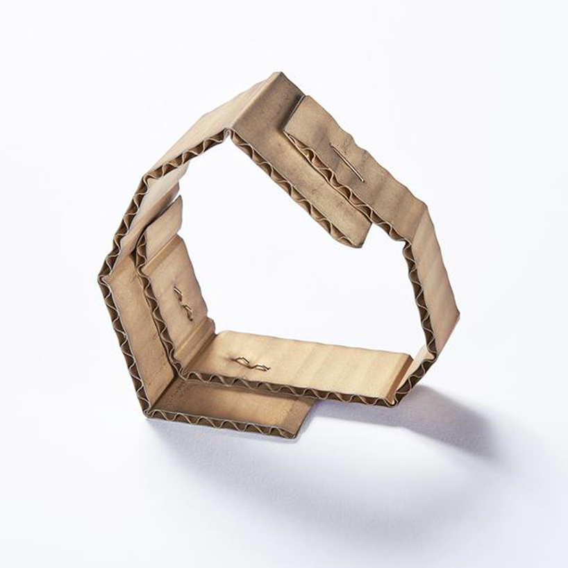 david bielander delicately crafts cardboard looking bracelets made of gold