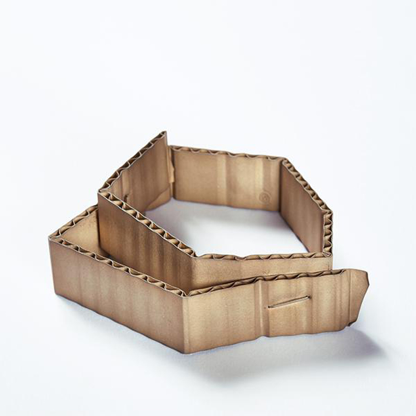 david bielander delicately crafts cardboard looking bracelets made of gold