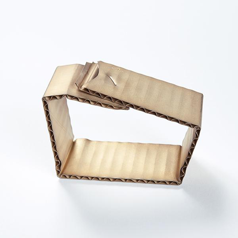 david bielander delicately crafts cardboard looking bracelets made of gold