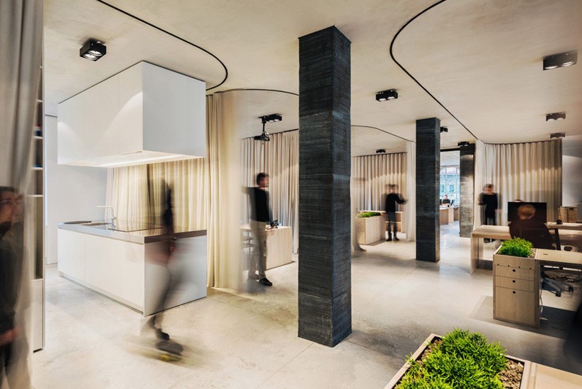 slovenian office by dekleva gregorič arhitekti can be divided with retractable curtains