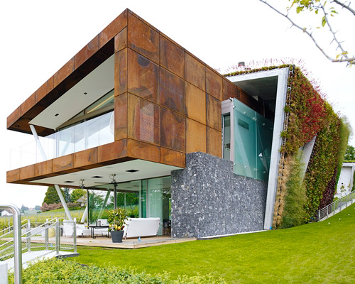 design paradigms builds eco-friendly jewel box villa in switzerland