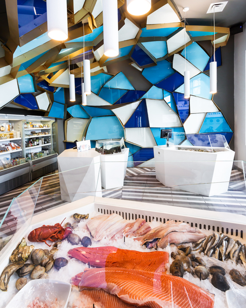 jean de lessard wraps némeau seafood shop in quebec city with