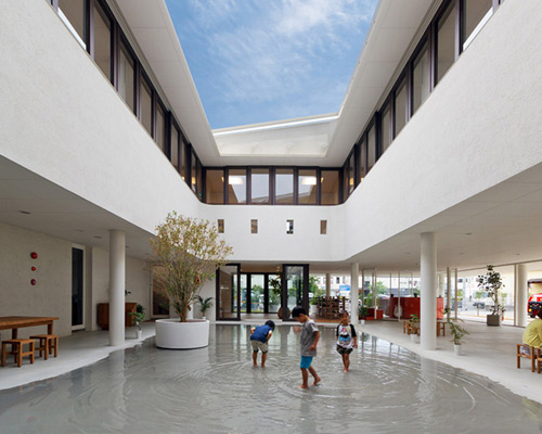 puddle-filled D1 kindergarten and nursery completed in kumamoto