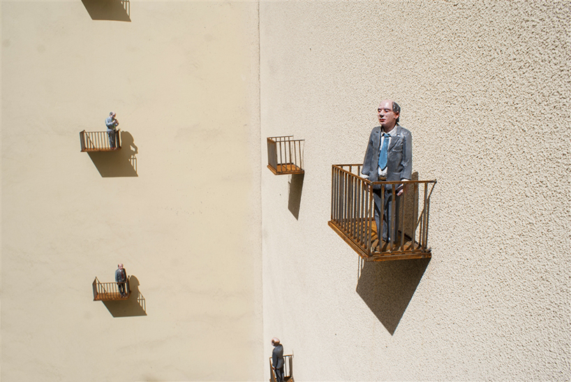 isaac cordal cages isolated miniuatures in the modern outdoors