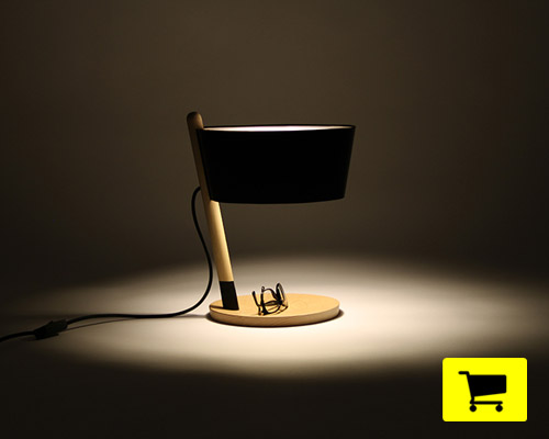 ka lamp collection combines wood with steel and leather