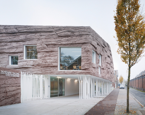d'houndt + bajart architects carves rock façade for school canteen in france